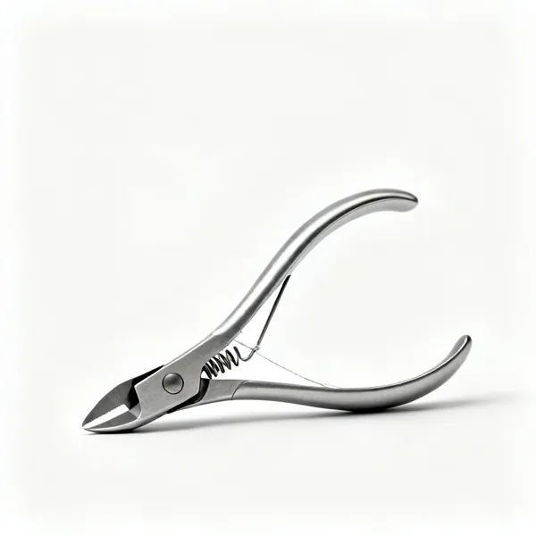 A pair of spring loaded thread snips with a curved handle