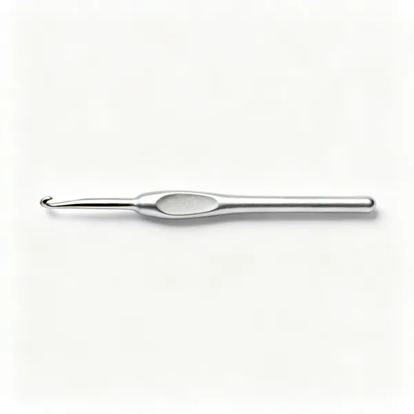 Small crochet hook: A small aluminium crochet hook with a thumb rest