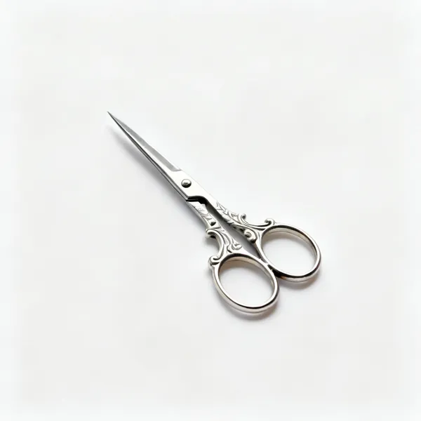 Small scissors: A pair of small sharp embroidery scissors with decorative handles