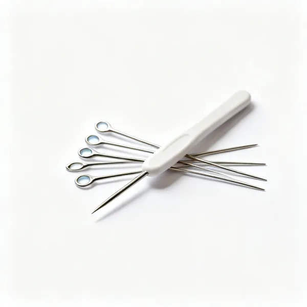 Yarn needles: Several blunt tipped yarn darning needles with large eyes