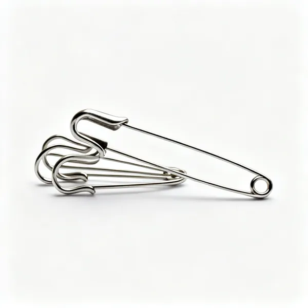 Curved basting pins: Several curved metal basting safety pins