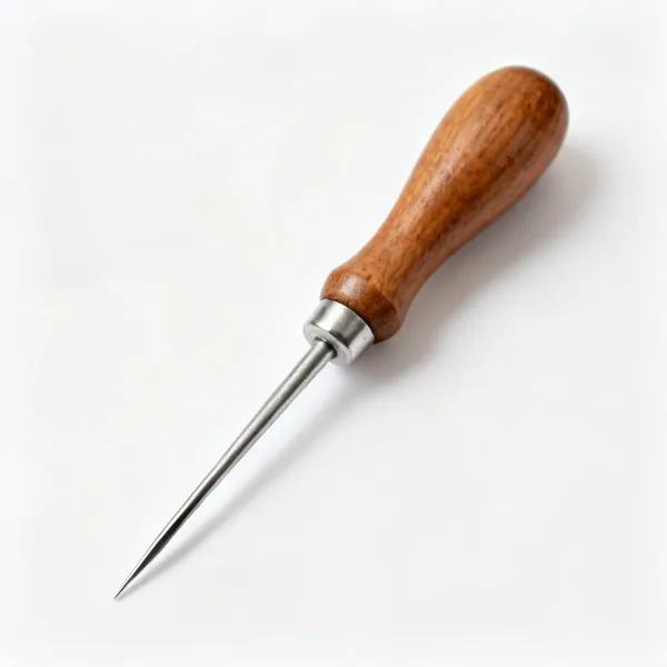 A tailor's awl with a sharp steel point and a wooden handle