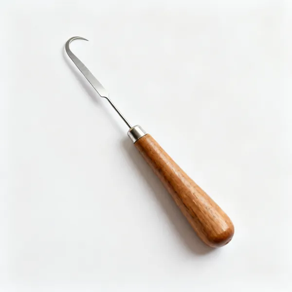 A seam ripper with a hooked blade and a wooden handle