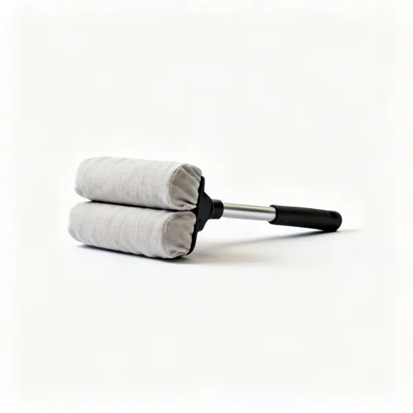 A pair of covered fabric shoulder pads of moderate thickness