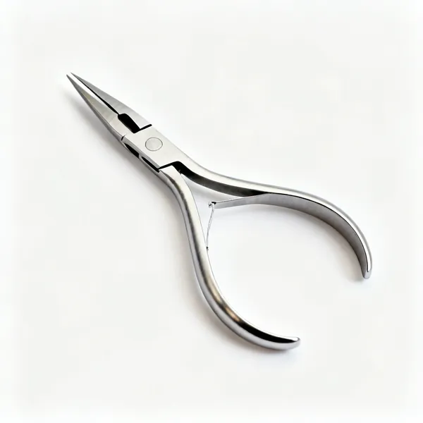 A pair of spring loaded thread snips with a curved metal handle