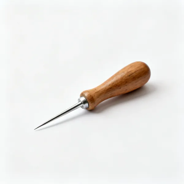 A sewing awl with a wooden handle and steel point
