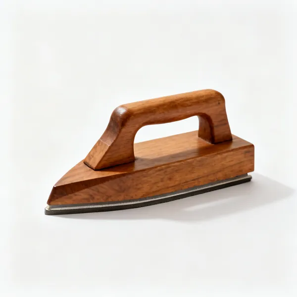A wooden tailor's clapper pressing block
