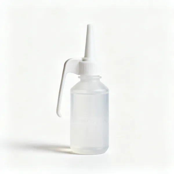 A bottle of sewing machine oil