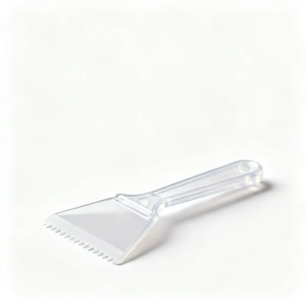 Notched spreader: A plastic notched adhesive spreader