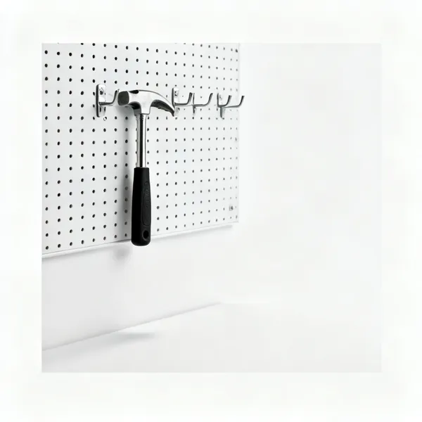 A pegboard wall with tool hooks