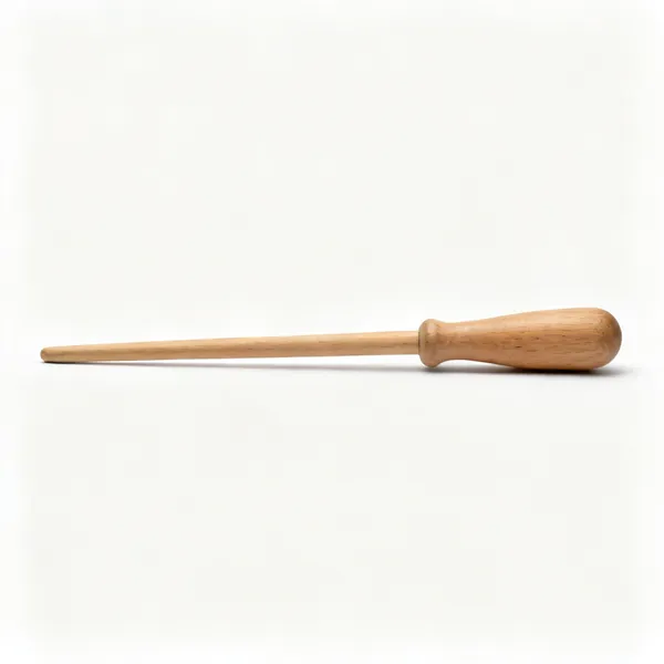A wooden upholstery stuffing stick