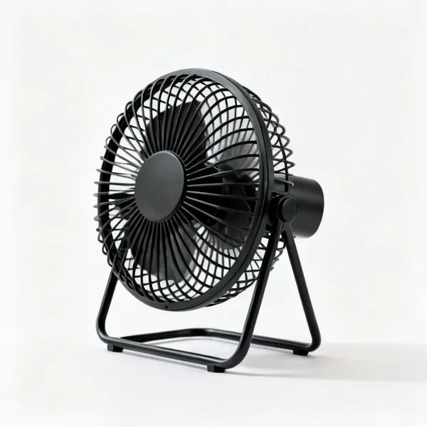 A small black desk fan with a round guard