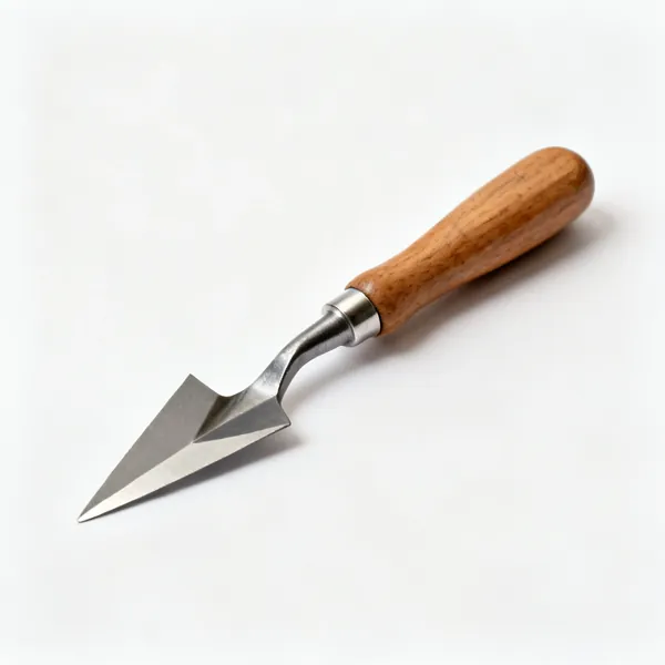 V tool: A wood carving V parting tool with a V shaped cutting edge and a wooden handle